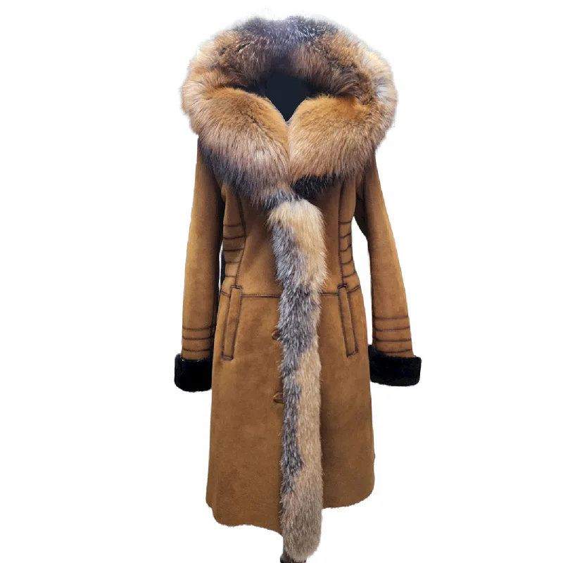 women’s trendy boots for winter style -Chantal's Tan Shearling coat with large fox fur hoodie and trim